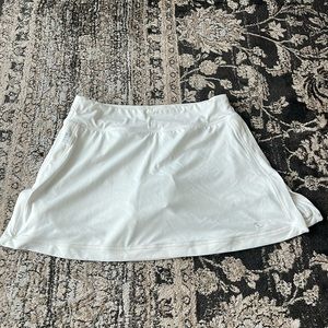 Nike size small white tennis skirt with built in shorts.